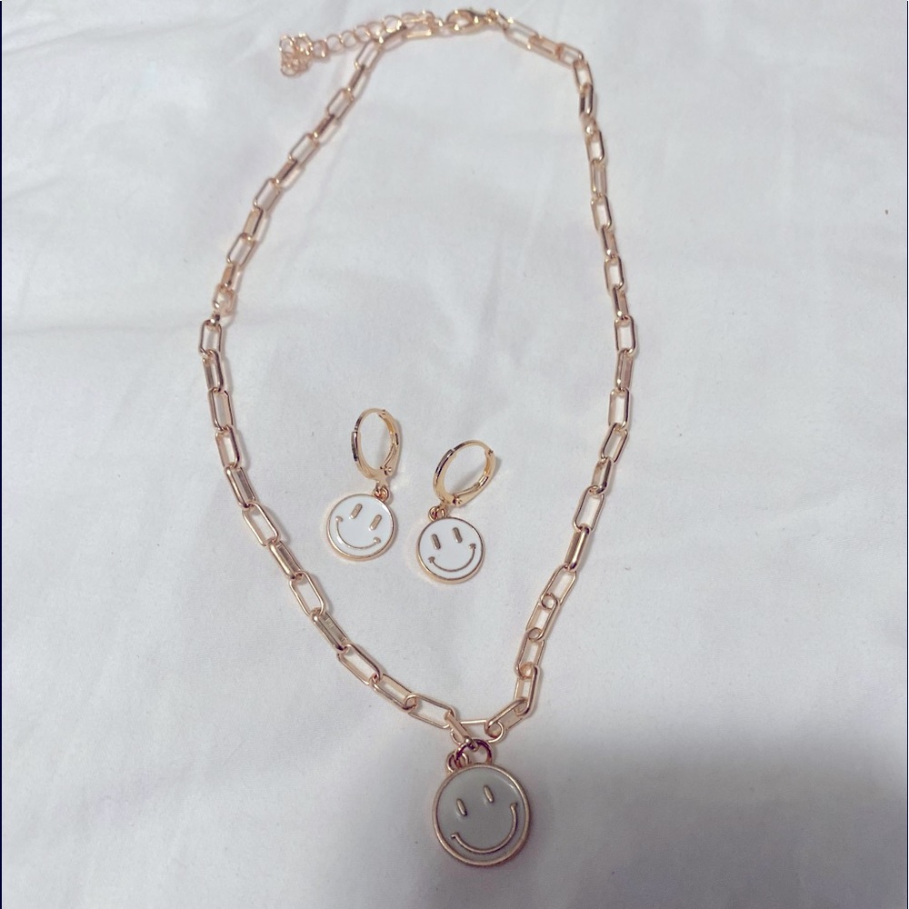 White smiley face necklace & earrings